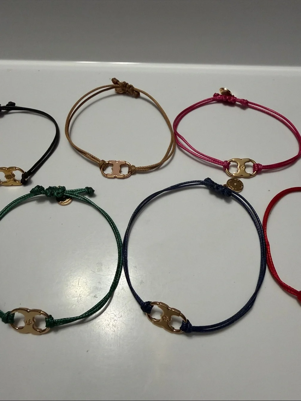 7 Tory Burch Gold Accent Cord Bracelet - Multiple Colors
